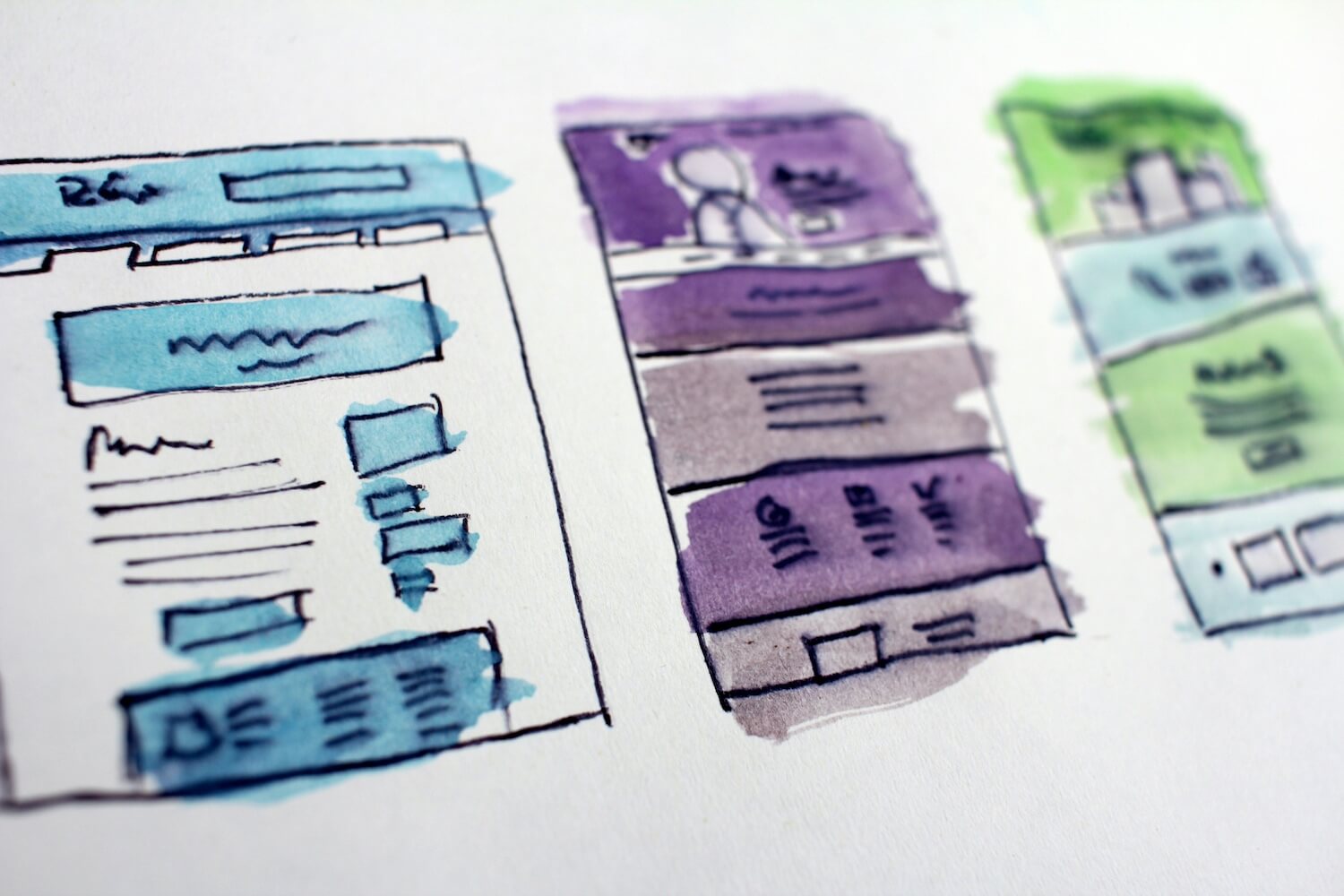 水色と紫と緑色で配色されたWebデザインイメージ案